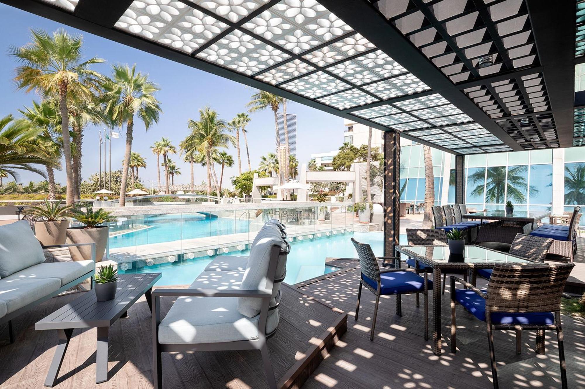 Sheraton Jeddah Hotel - Saudi Brothers Commercial Company Branch Exterior photo The pool at the hotel